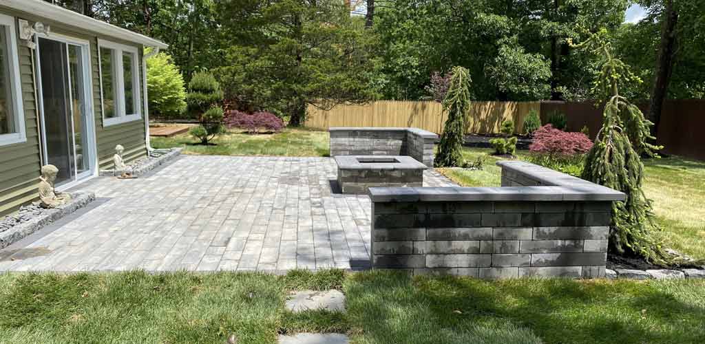 Concrete paver patio with fire.