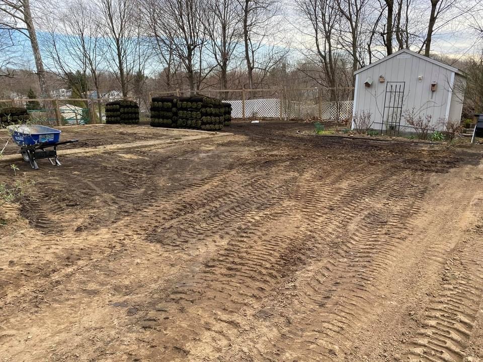 Yard grading and lawn installation. Recently graded lawn ready for seed.