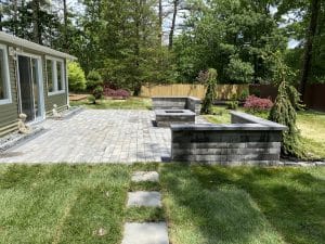 Concrete paver patio with fire.