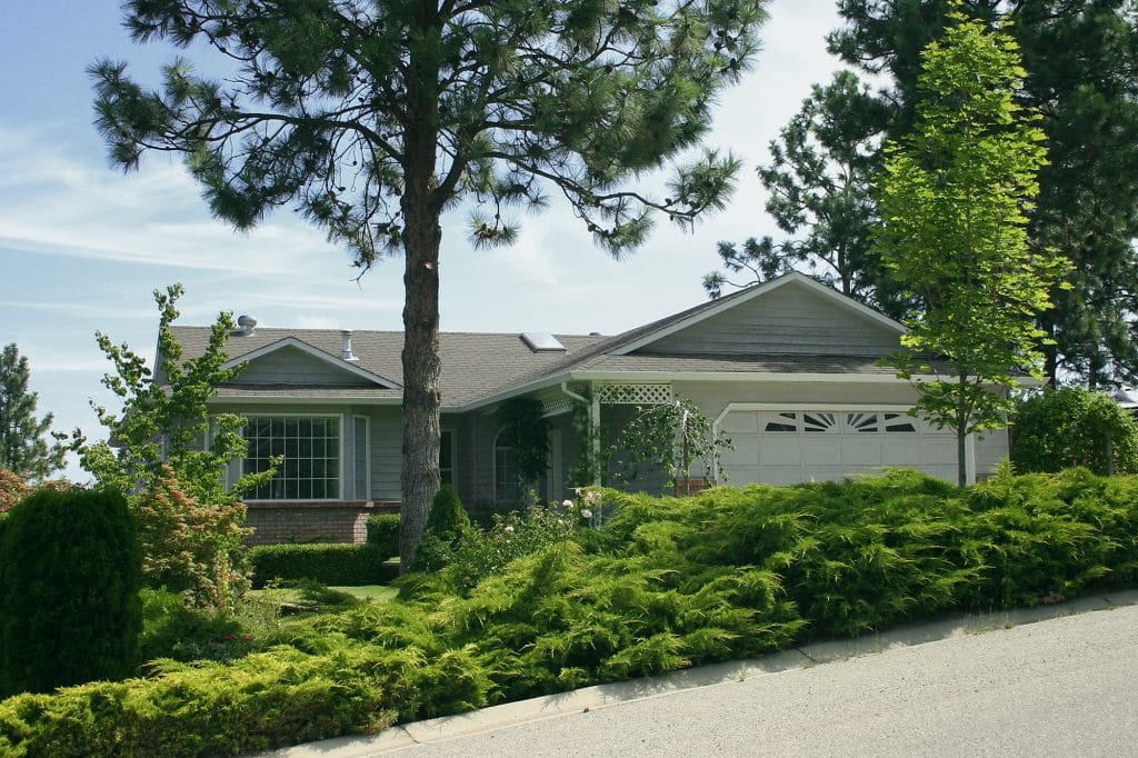 Home with sloped yard.
