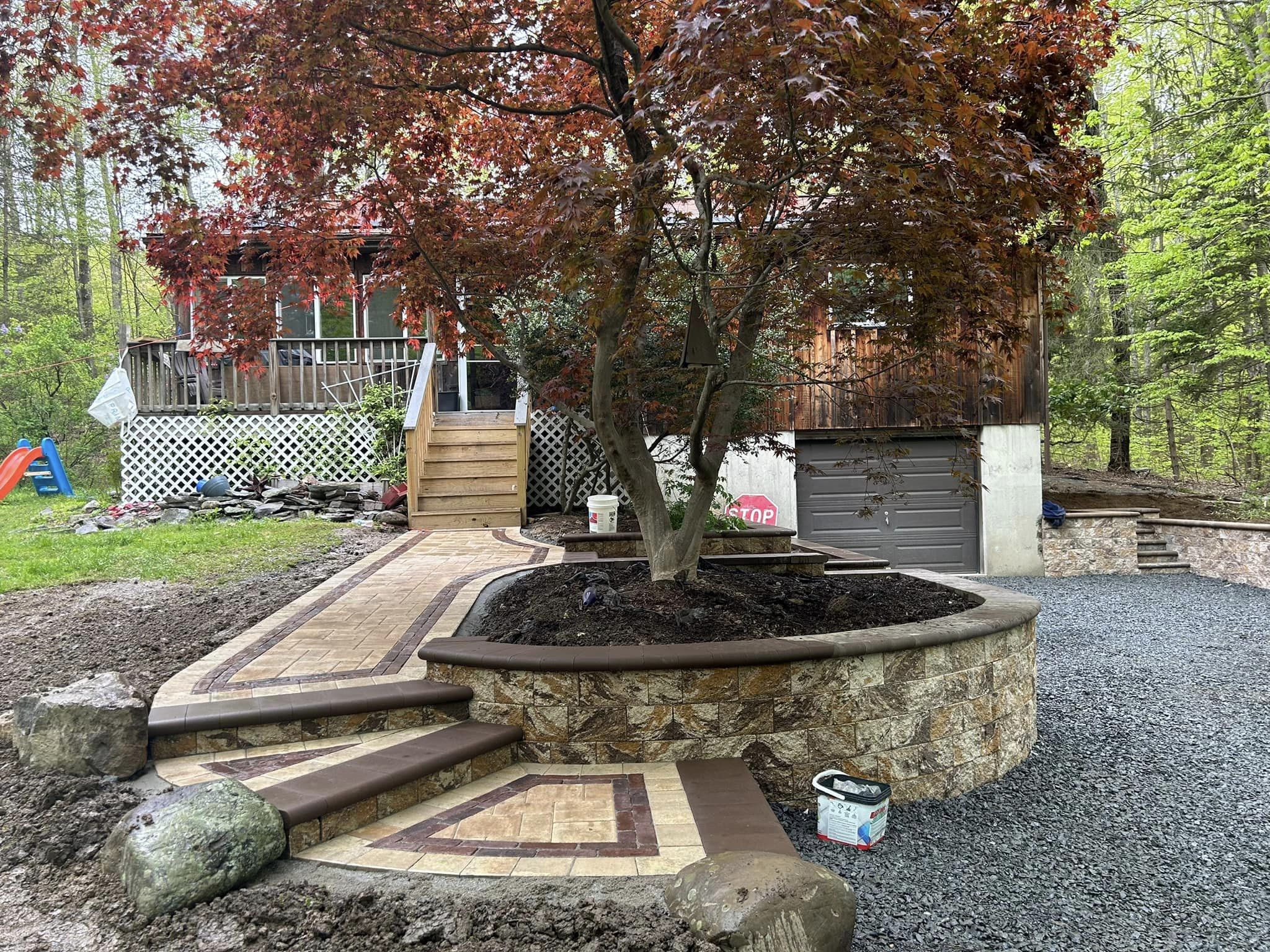 Precast concrete paver walkway and planting area