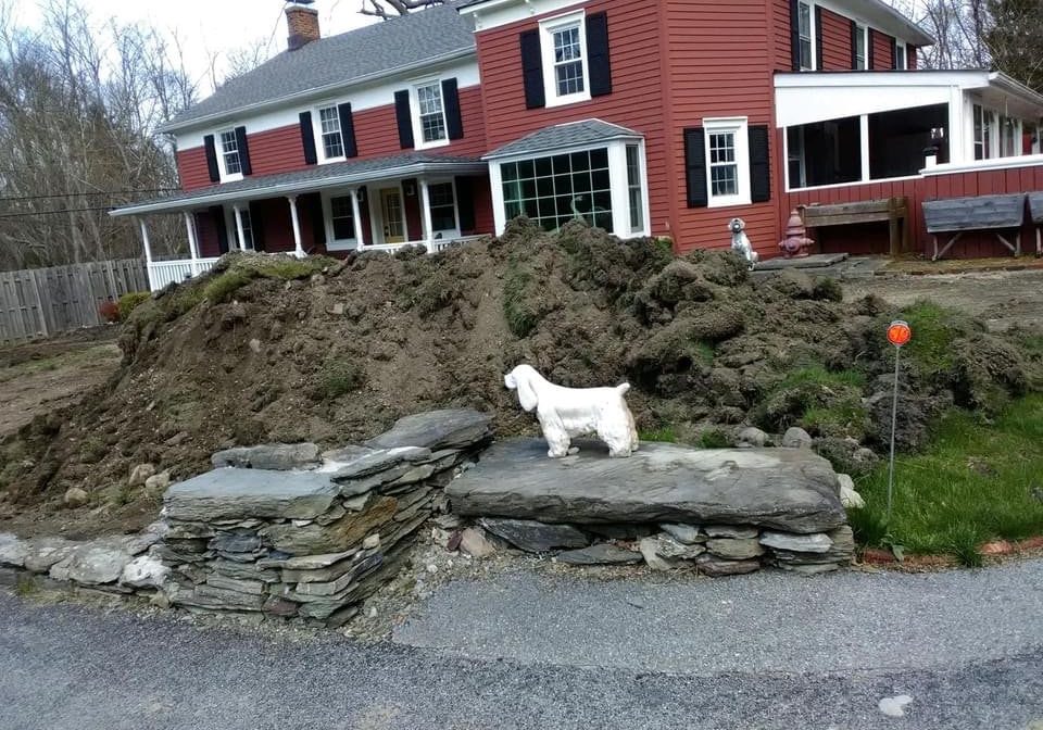 Hole dug in front of home.