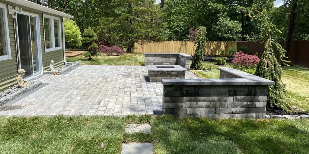 Concrete paver patio with fire.