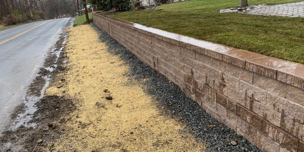 Precast concrete block retaining wall.